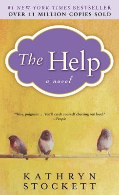 Paperback copy of "The Help" by Berkley Books, featuring the book cover with title and author details.