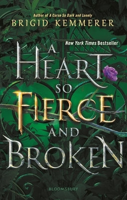 Paperback of "A Heart So Fierce and Broken" by Bloomsbury YA, showing the book cover with vibrant artwork.