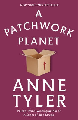 Paperback copy of "A Patchwork Planet" by Vintage, showing the book cover with colorful patchwork design.