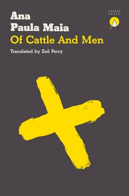 Paperback of Cattle and Men by Charco Press, featuring the book's cover with bold title and artwork in natural light.