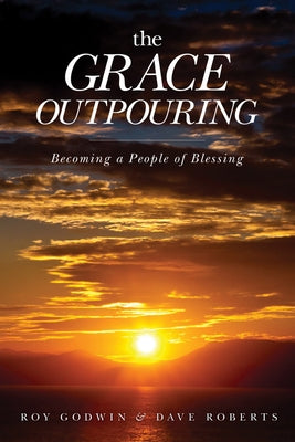 Paperback copy of "The Grace Outpouring: Becoming a People of Blessing" by David C Cook, showing the book cover with title and author.