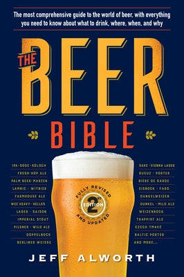Paperback copy of The Beer Bible Second Edition by Workman Publishing, featuring colorful cover art with beer glasses and brewing details.