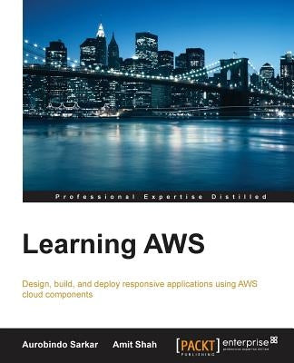 Paperback book titled "Learning AWS" by Packt Publishing, featuring a cover with cloud computing graphics.