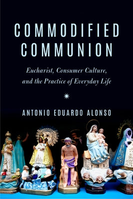 Paperback book titled "Commodified Communion" by Fordham University Press, featuring a cover with religious and consumer culture themes.