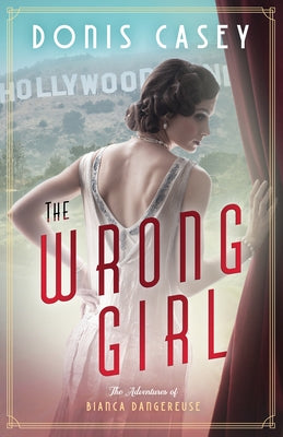The Wrong Girl Paperback Poisoned Pen Press