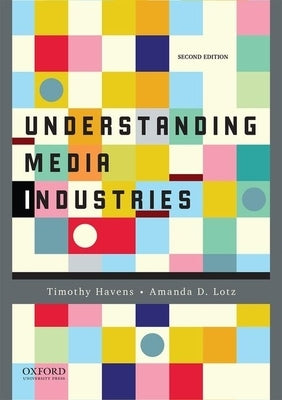 Paperback of Understanding Media Industries by Oxford University Press, USA, showing the book cover with title and publisher details.
