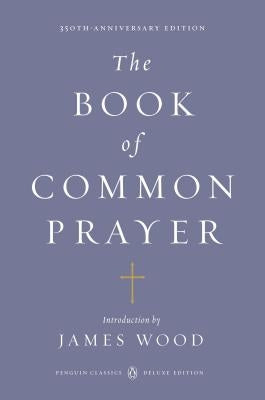 Open Penguin Classics Deluxe Edition of The Book of Common Prayer with leather-bound cover and gilded edges, displayed on a wooden surface.