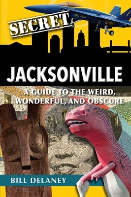 Paperback copy of "Secret Jacksonville" guidebook by Reedy Press showing the book's front cover with colorful city illustrations.
