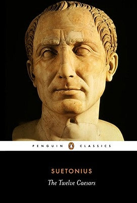 Paperback copy of The Twelve Caesars by Penguin Group, showing the book cover with title and author details.