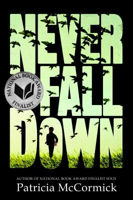 Paperback copy of "Never Fall Down" by Balzer & Bray/Harperteen featuring the book cover with title and author text.