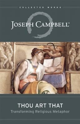 Paperback copy of "Thou Art That: Transforming Religious Metaphor" by New World Library, showing the book cover with title and design.