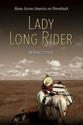 Paperback book titled "Lady Long Rider: Alone Across America on Horseback" by Farcountry Press, with cover image showing a woman riding a horse.