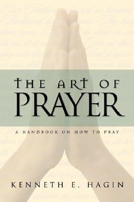 Open book titled "The Art of Prayer" from Faith Library Publications, showing pages with elegant text and prayer illustrations.