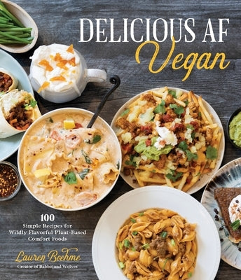 Paperback cookbook titled Delicious AF Vegan featuring 100 plant-based comfort food recipes with colorful food images.