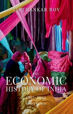 Paperback of The Economic History of India 1857 to 2010, 4th Edition by Oxford University Press, USA, showing the book cover and title.