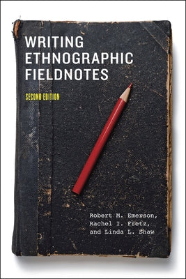 Paperback book titled "Writing Ethnographic Fieldnotes" by University of Chicago Press, featuring a cover with handwritten notes and a pen.