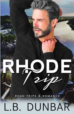 Paperback novel "Rhode Trip" by L.B. Dunbar Writes, Ltd., showing the book cover with colorful artwork and title text.