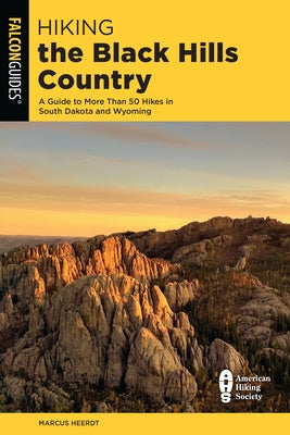 Cover of Falcon Press Publishing's hiking guidebook featuring scenic black hills landscape for South Dakota and Wyoming hikes