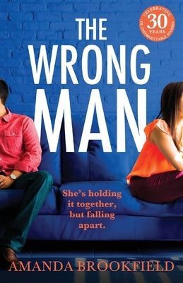 Paperback of The Wrong Man by Boldwood Books Ltd with a cover featuring a mysterious figure and dark, moody imagery.