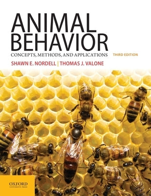 Paperback book titled "Animal Behavior: Concepts, Methods, and Applications" by Oxford University Press, USA, featuring a colorful cover.