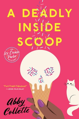 Paperback copy of A Deadly Inside Scoop by Berkley Books, featuring the book cover with title and author text.