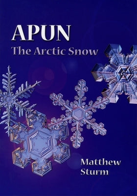 Paperback copy of "Apun, the Arctic Snow" by University of Alaska Press, featuring a snowy Arctic landscape on the cover.
