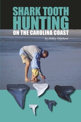 Paperback book titled "Shark Tooth Hunting on the Carolina Coast" by Pineapple Press, featuring a coastal scene with shark teeth illustrations.