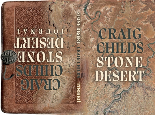 Paperback copy of "Stone Desert" novel by Torrey House Press with a desert landscape cover design.