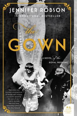 Paperback of "The Gown: A Novel of the Royal Wedding" by William Morrow & Company, showing the book cover with elegant design.