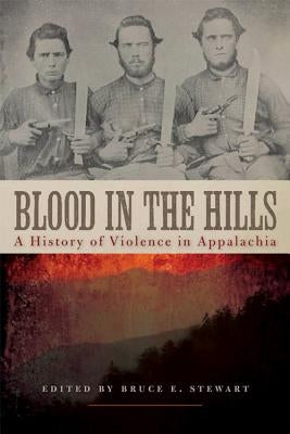 Paperback copy of "Blood in the Hills: A History of Violence in Appalachia" by University Press of Kentucky, with book cover visible.