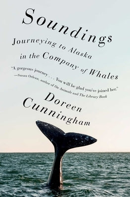 Paperback copy of "Soundings: Journeying to Alaska in the Company of Whales" by Scribner Book Company, showing the book cover.