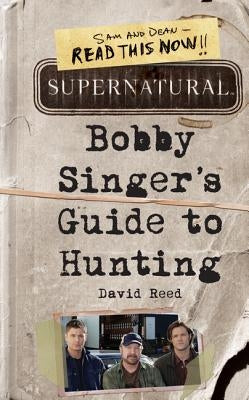Paperback copy of Supernatural: Bobby Singer's Guide to Hunting by It Books, featuring the book cover with title and illustrations.