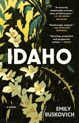 Paperback copy of Idaho novel by Random House Trade, featuring the book cover with title and author details.