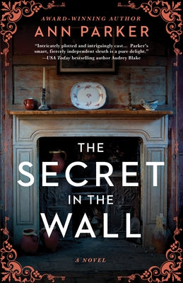 The Secret in the Wall Paperback Poisoned Pen Press