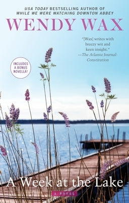 A paperback copy of "A Week at the Lake" by Berkley Books, featuring a scenic cover with a lakeside scene and relaxing atmosphere.