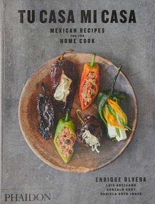 Paperback of "Tu Casa Mi Casa" by Phaidon Press featuring colorful Mexican recipes for home cooks.