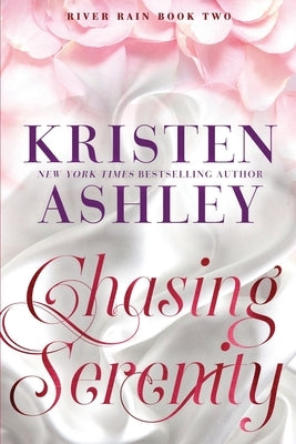 Paperback of Chasing Serenity: A River Rain novel by Blue Box Press, showing the book cover with serene river imagery.