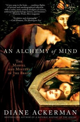 Paperback book titled "An Alchemy of Mind" by Scribner Book Company, featuring a colorful abstract cover design.