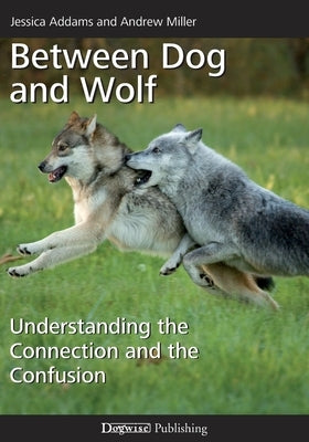 Paperback of "Between Dog and Wolf" by Dogwise Publishing showing the book cover with title and author text.