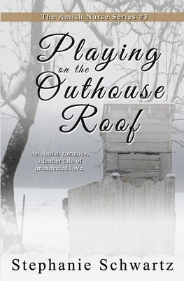 Paperback book titled "Playing on the Outhouse Roof" by Satin Romance, featuring colorful cover art with rustic outdoor scene.
