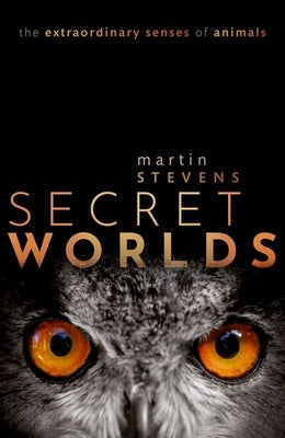 Paperback book titled "Secret Worlds: The Extraordinary Senses of Animals" by Oxford University Press, USA, with colorful cover art.