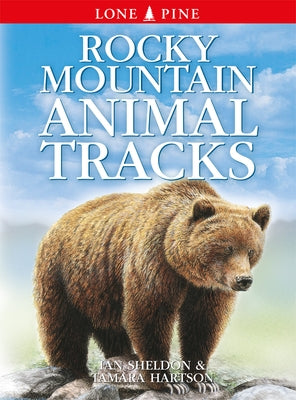 Paperback Rocky Mountain Animal Tracks book by Lone Pine Media Productions BC showing detailed wildlife footprints and tracks.