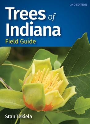 Paperback Trees of Indiana Field Guide by Adventure Publications featuring illustrations of various Indiana tree species.