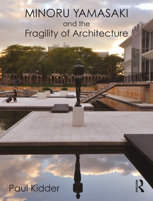 Paperback book titled "Minoru Yamasaki and the Fragility of Architecture" by Routledge, showing the front cover with architectural imagery.