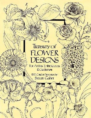 Open book showing detailed flower design illustrations from the Treasury of Flower Designs for Artists by Dover Publications.