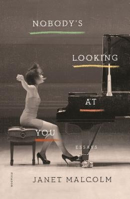 Paperback of Nobody's Looking at You: Essays by Picador USA, featuring a close-up of the book cover with text and design elements.