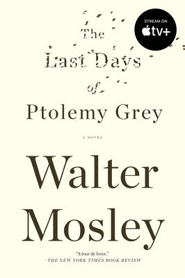 Paperback copy of "The Last Days of Ptolemy Grey" by Riverhead Books, showing the book cover with title and author.