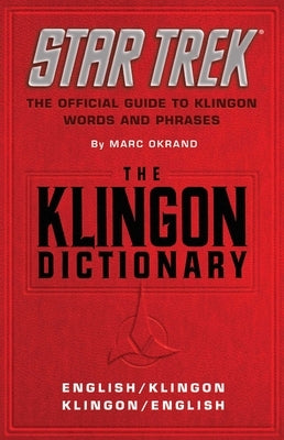 Star Trek The Klingon Dictionary paperback book with cover featuring Klingon language symbols and text.