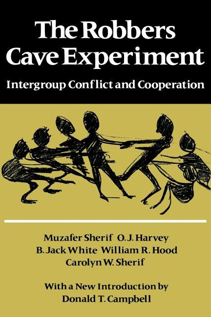 Paperback book titled "The Robbers Cave Experiment" by Wesleyan University Press, showing the cover with title and author.
