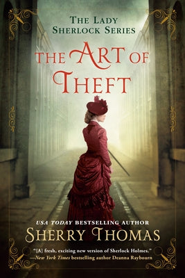 Paperback copy of The Art of Theft novel by Berkley Books, showing the book cover with title and author details.